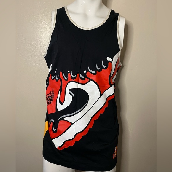 Large array of tank tops. - Picture 1 of 12